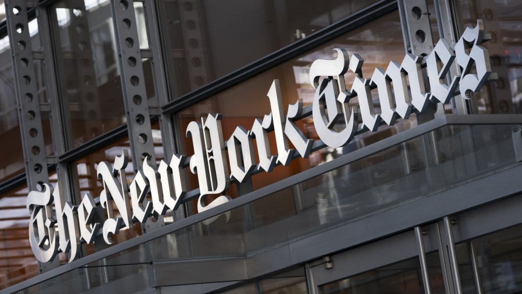 A sign for The New York Times hangs above the entrance to its building, Thursday, May 6, 2021 in New York. The New York Times filed a federal lawsuit against OpenAI and Microsoft on Wednesday, Dec. 27, 2023 seeking to end the practice of using published material to train chatbots. (AP Photo/Mark Lennihan, File)